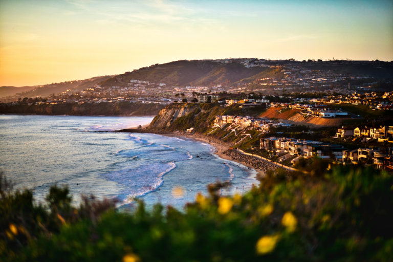 Aerial view of the coastline at sunset in Dana Point, CA